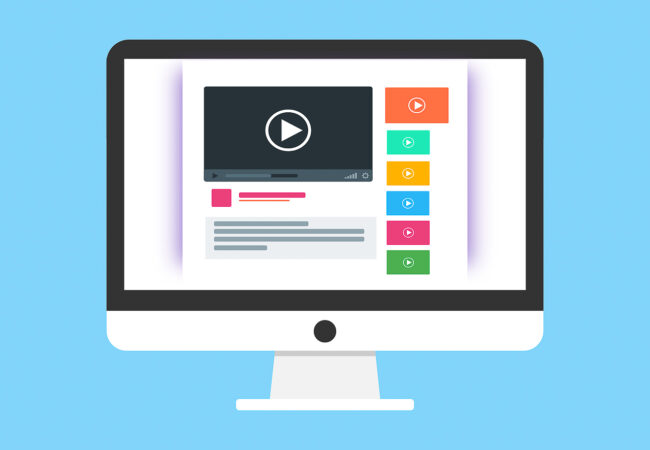 light blue background with illustration of computer monitor with webpage layout including video