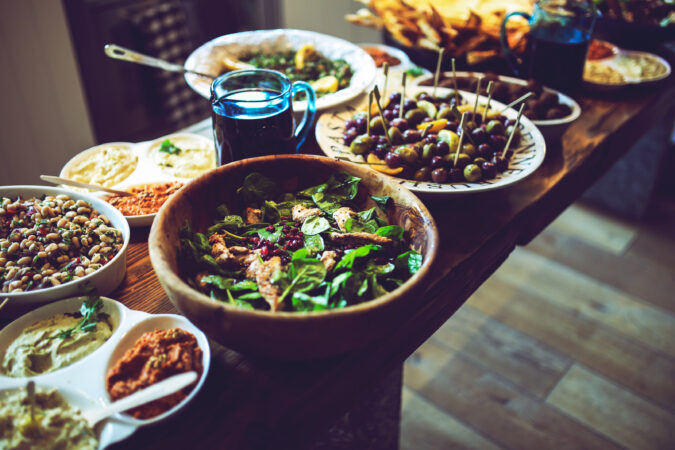 long spread of food on wood table